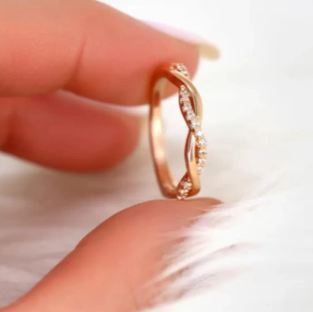Dainty 14k Gold and Simulated Diamonds CZ Twist Ring